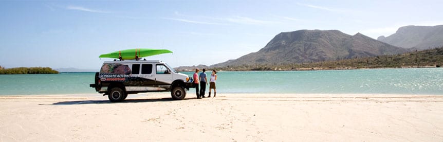 The The Ultimate Adventure vehicle on a Baja beach adventure.