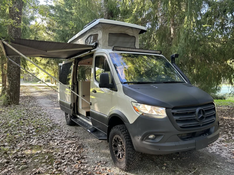 New 2022 Sprinter 2500 144 4x4 RB-150S, front three-quarter, passenger side, top up, awning out
