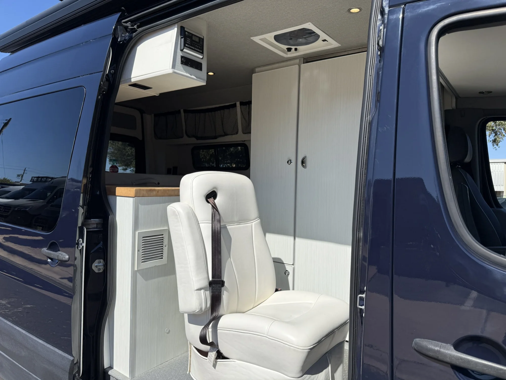 2018 Mercedes Sprinter 2500 144 High Roof 4x4, sliding door open, swivel seat