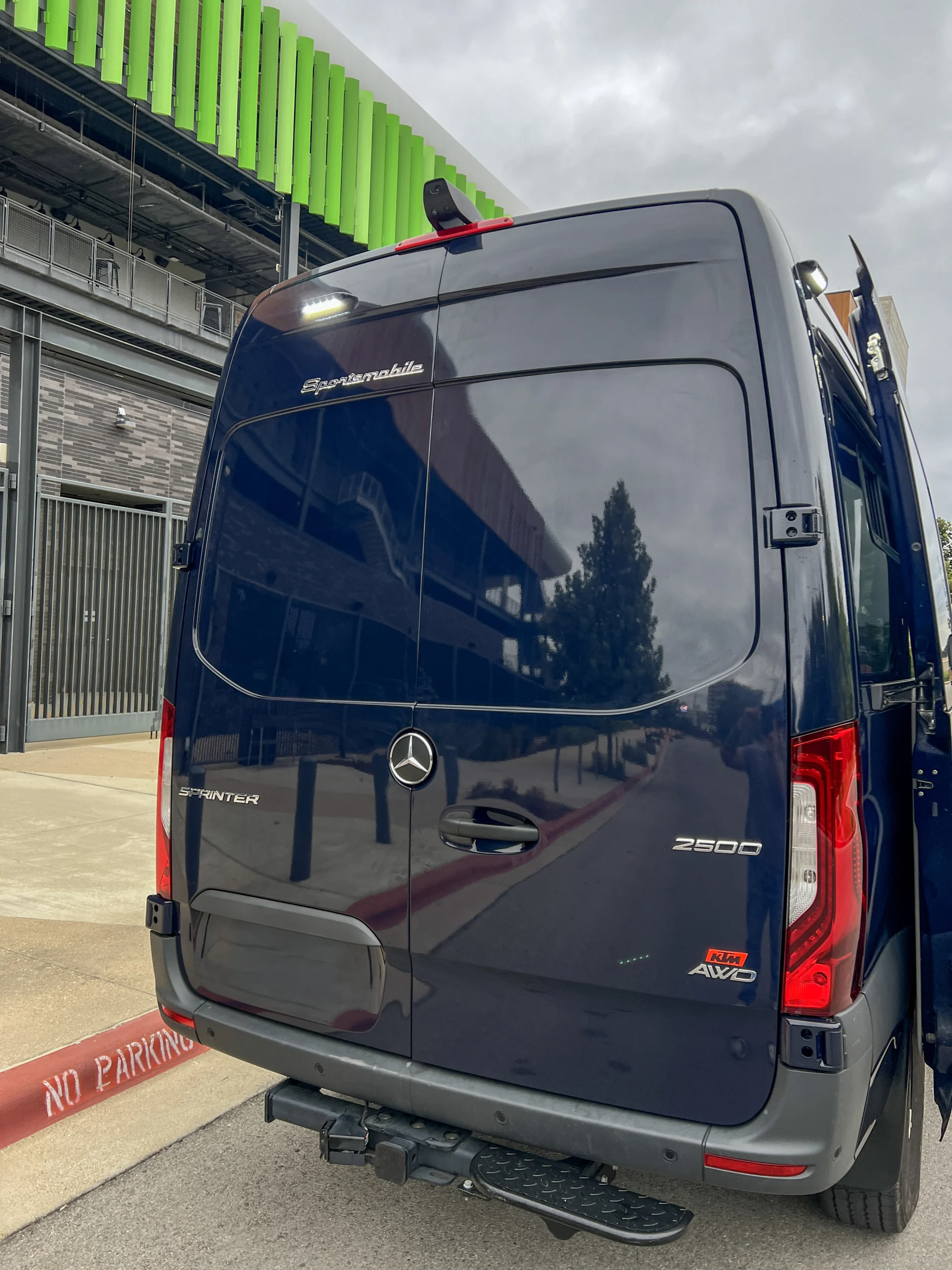 Mercedes Sprinter 2500 144 High Roof AWD Motorcycle Hauler and Front Sitting Area, exterior, rear doors with porch light above