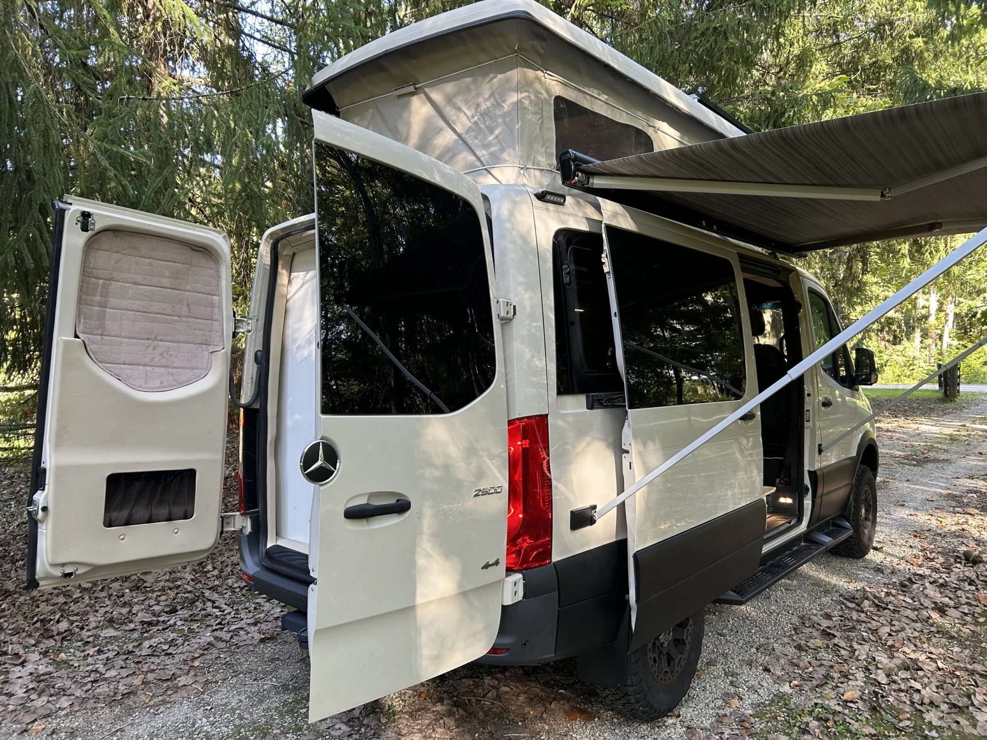 New 2022 Sprinter 2500 144 4x4 RB-150S, front three-quarter, passenger side, doors open, top up