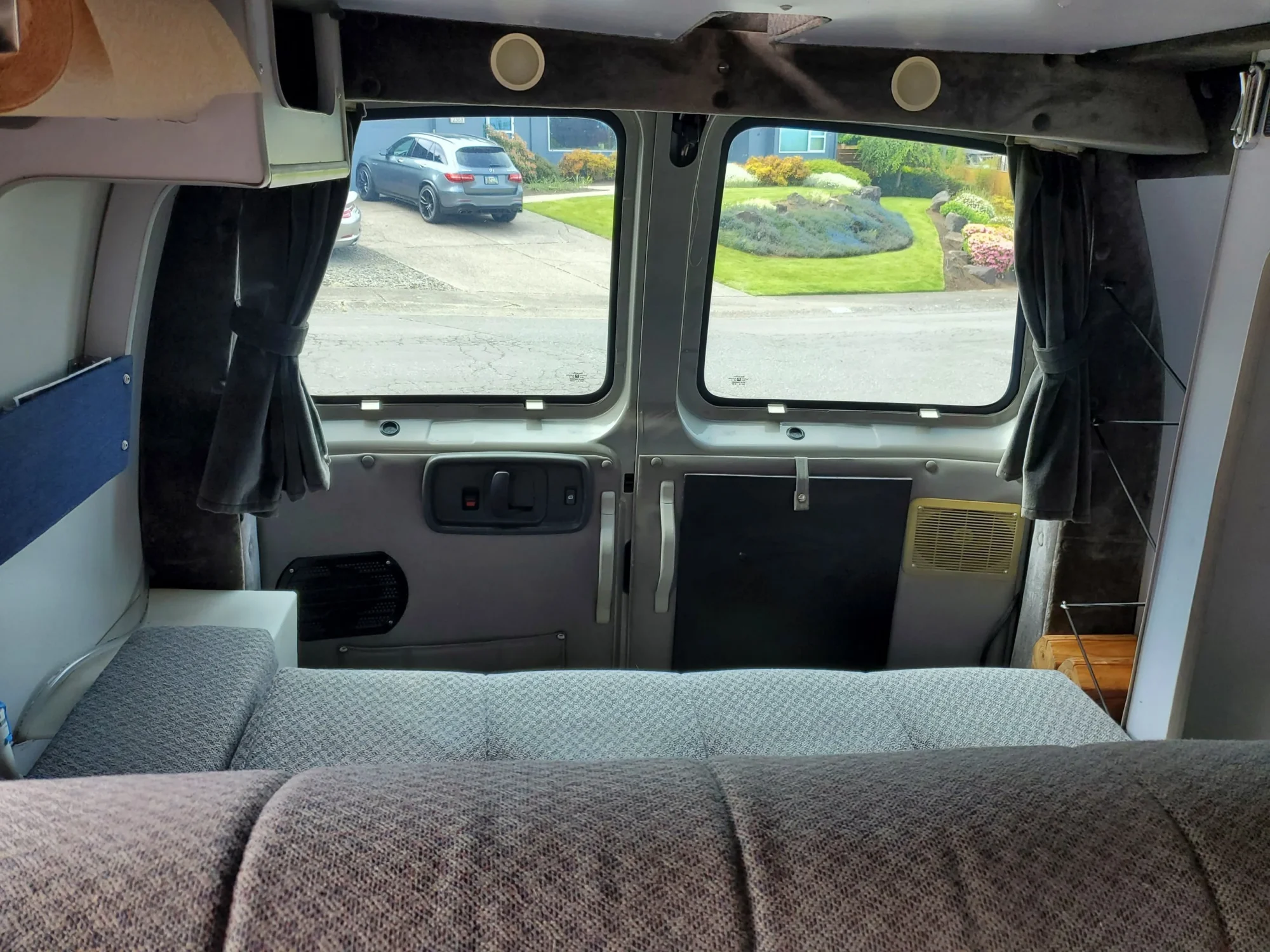 2001 Chevy Express 2500 EB50 Penthouse Top, rear sofa looking toward the rear doors