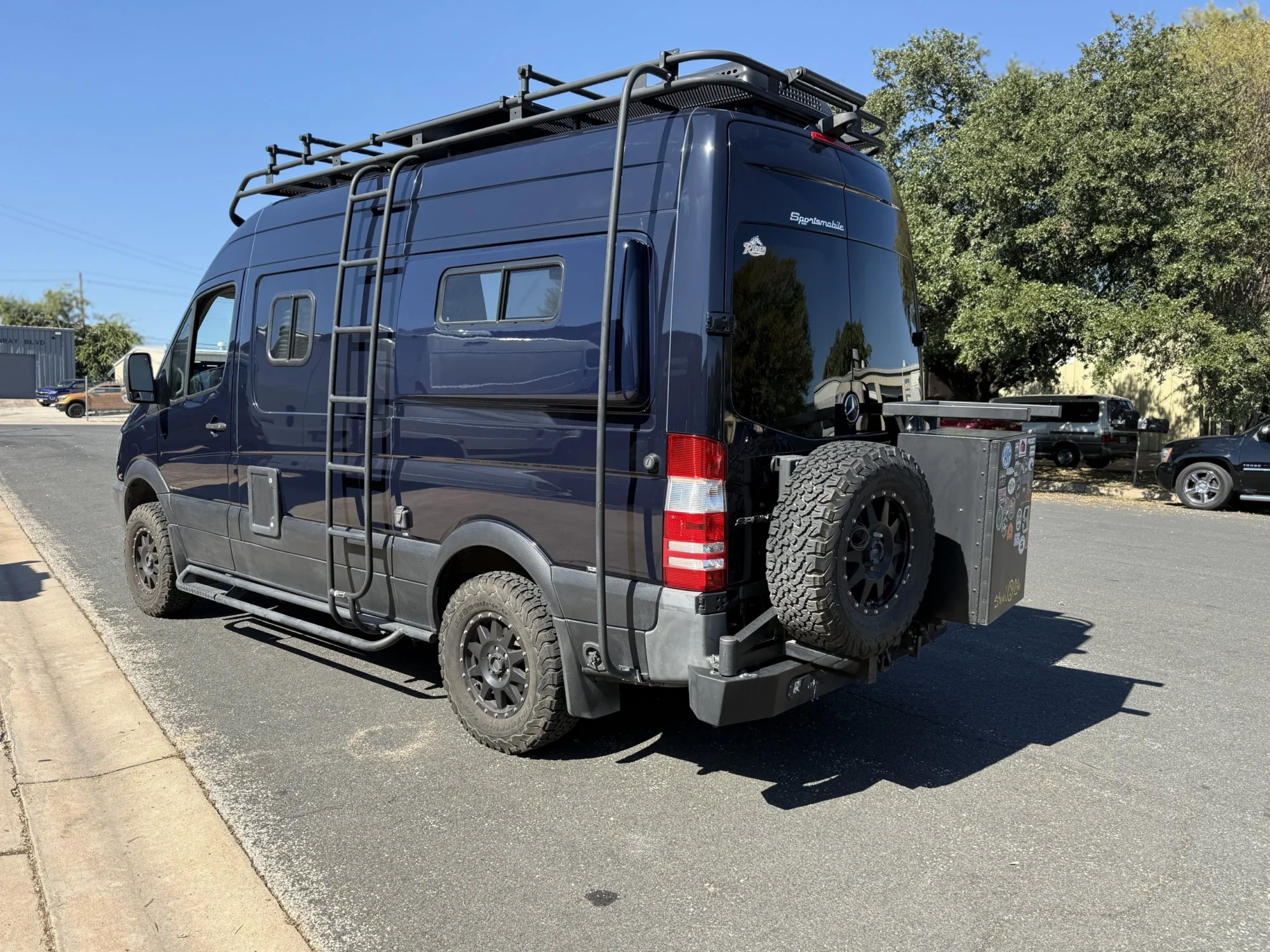 2018 Mercedes Sprinter 2500 144 High Roof 4x4, rear three-quarter with spare tire