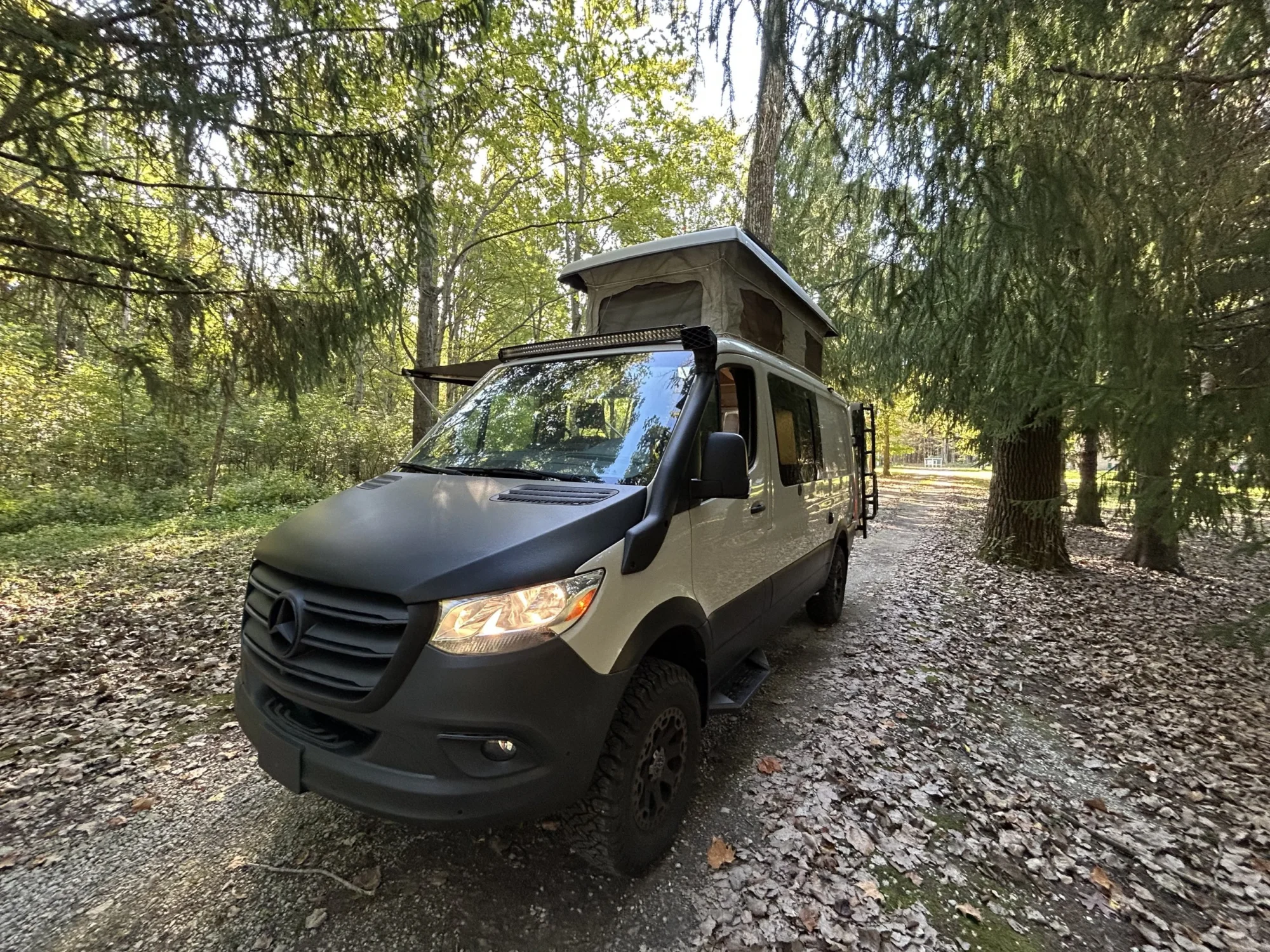 New 2022 Sprinter 2500 144 4x4 RB-150S, front three-quarter, driver side, top up