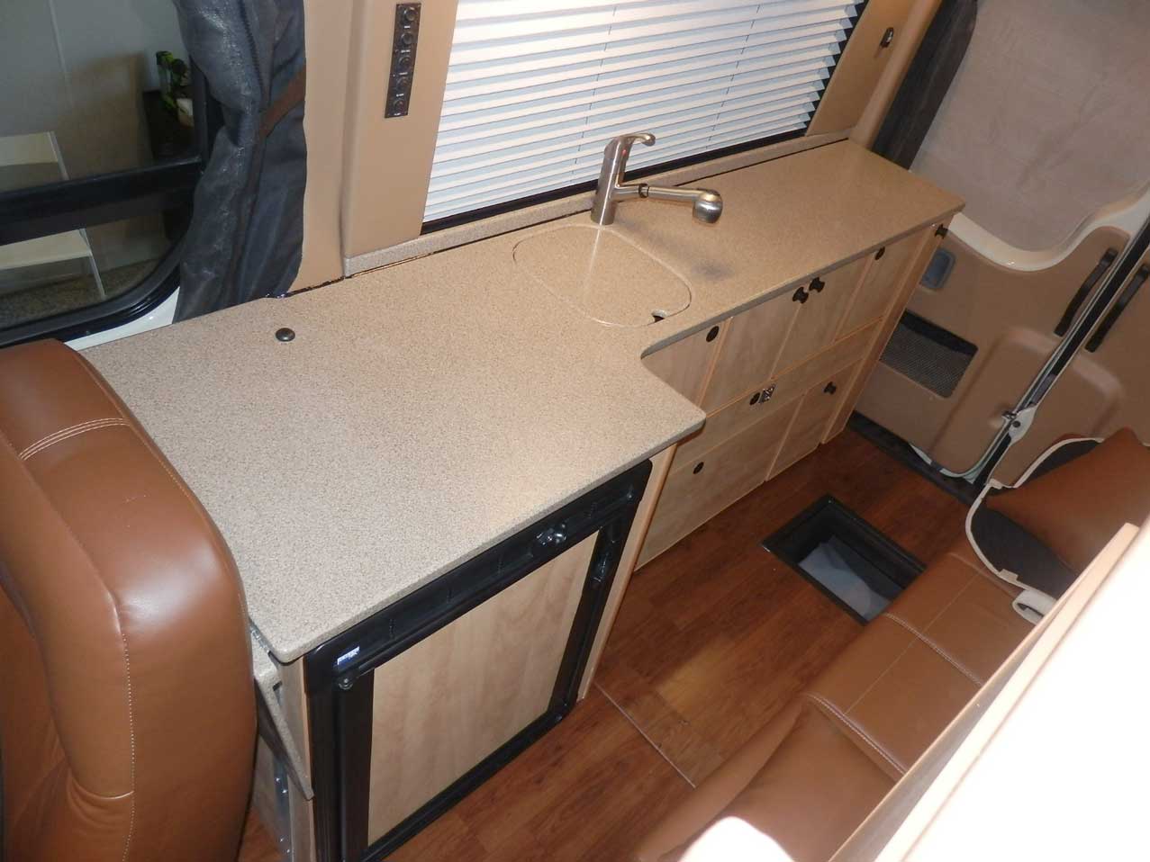 Transit camper conversion interior cabinets.