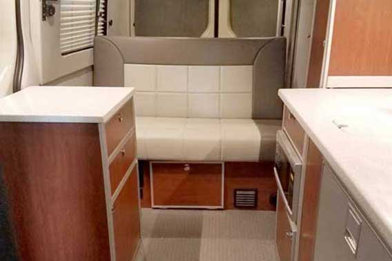 Van conversion with upgraded leather and wood options.