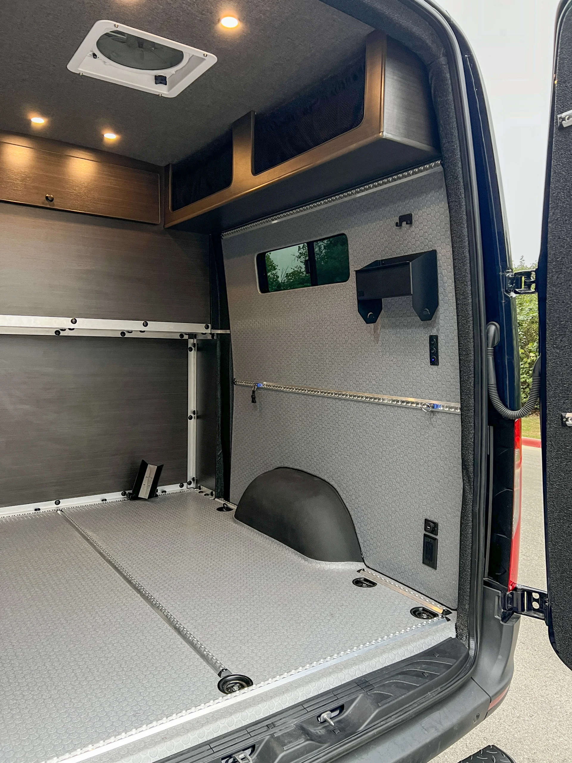 Mercedes Sprinter 2500 144 High Roof AWD Motorcycle Hauler and Front Sitting Area, garage with L Track, passenger side