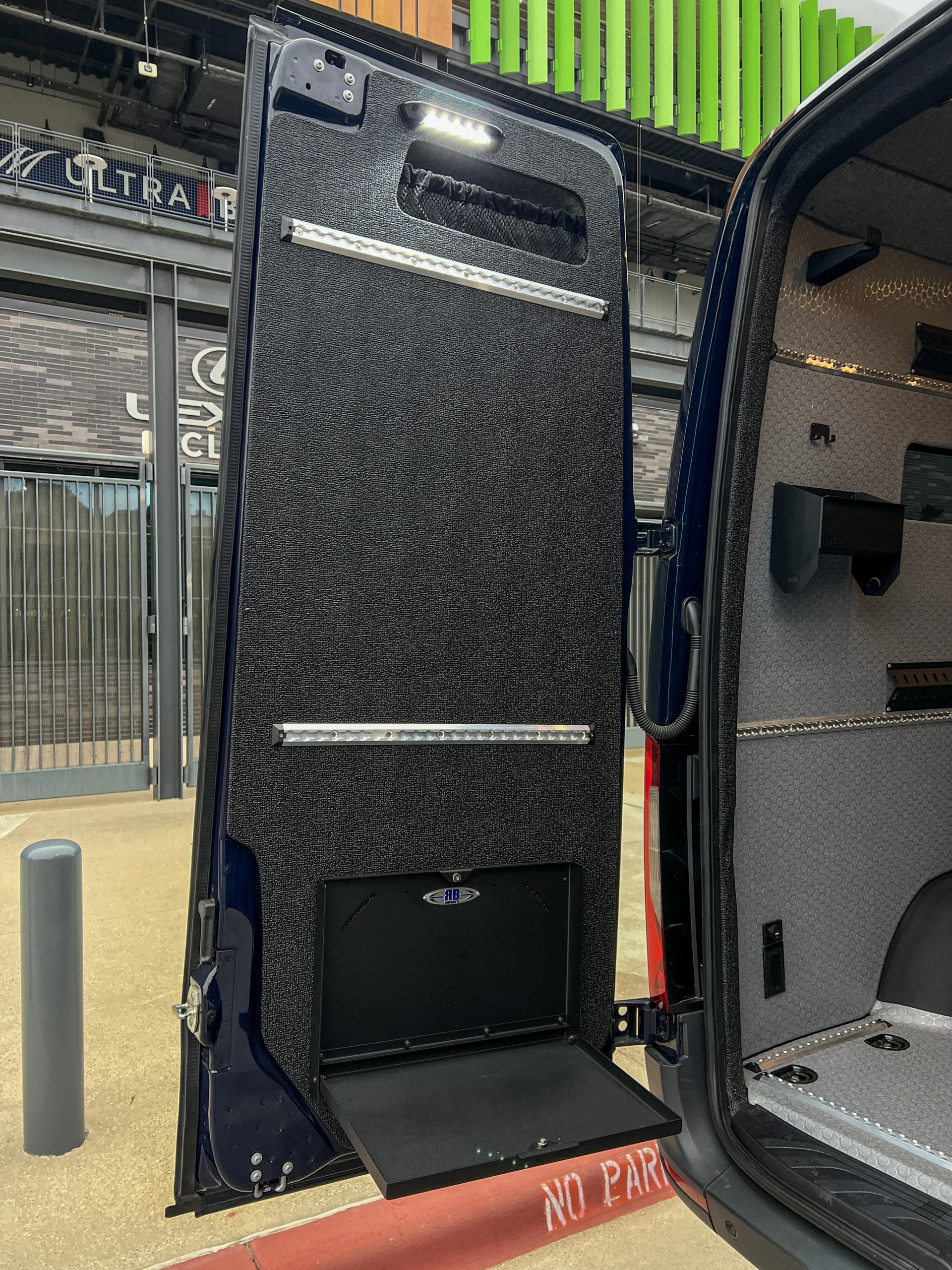 Mercedes Sprinter 2500 144 High Roof AWD Motorcycle Hauler and Front Sitting Area, rear door interior panels
