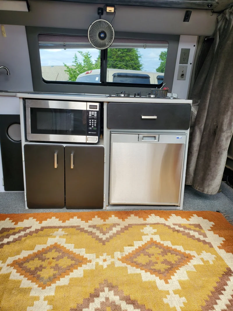 2001 Chevy Express 2500 EB50 Penthouse Top, galley with microwave, cabinets and fridge