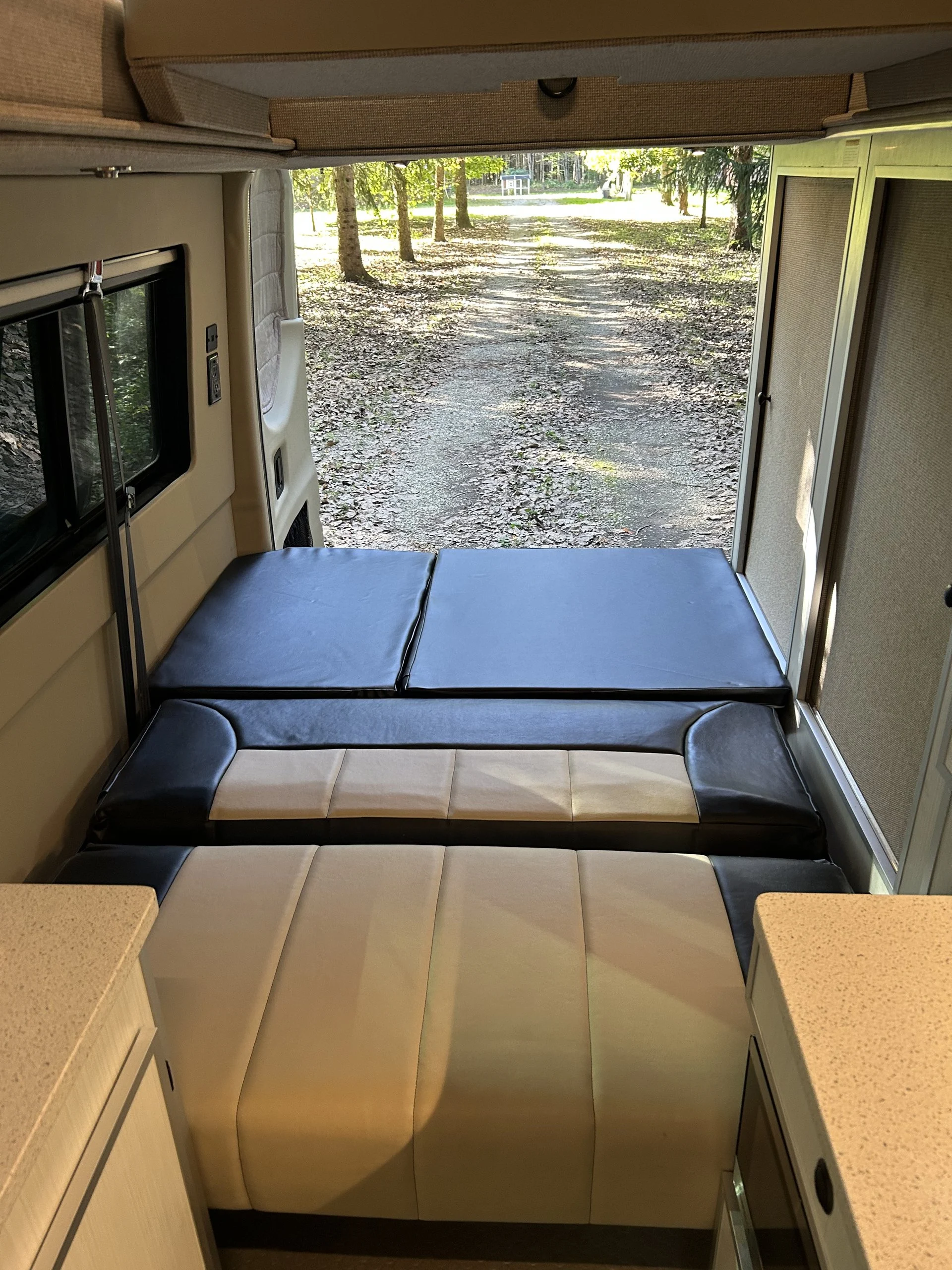 New 2022 Sprinter 2500 144 4x4 RB-150S, rear seating and bed, looking rearward