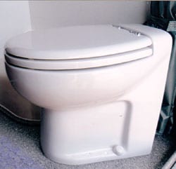 A white marine Macerator toilet.