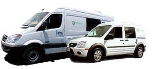 Two white Campervan North America vans.