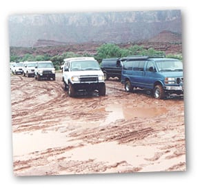 Sportsmobiles in the mud