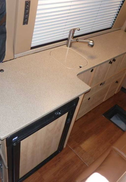 Transit camper conversion interior cabinets.