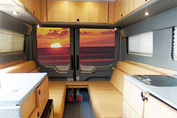 Ford Transit conversion van with upgraded leather upholstery and dinette.