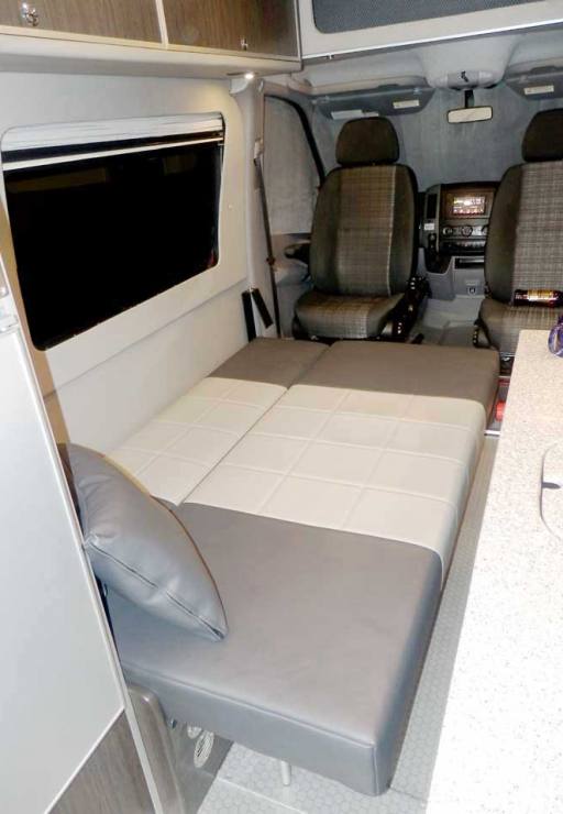 Interior view of a custom Sportsmobile Sprinter 4x4 van conversion with gaucho.