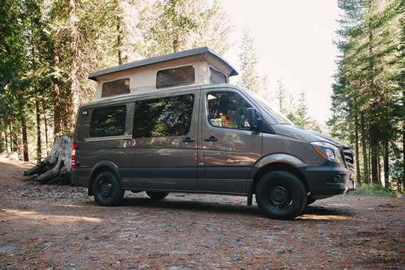 Grey Sprinter van conversion with the pop top extended.