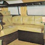 1970s Sportsmobile Clubcar conversion van interior featuring leather sofas.