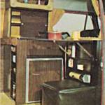 1970s Sportsmobile Clubcar conversion van interior featuring storage and cabinets.