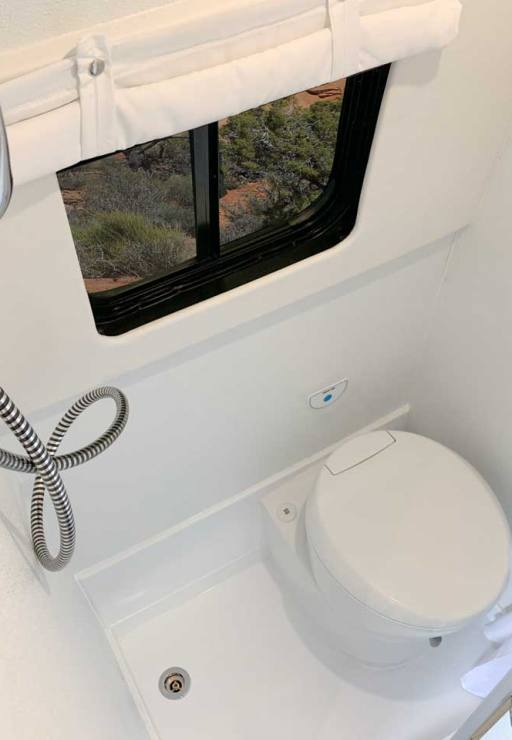 Custom Sprinter conversion van with bath compartment.