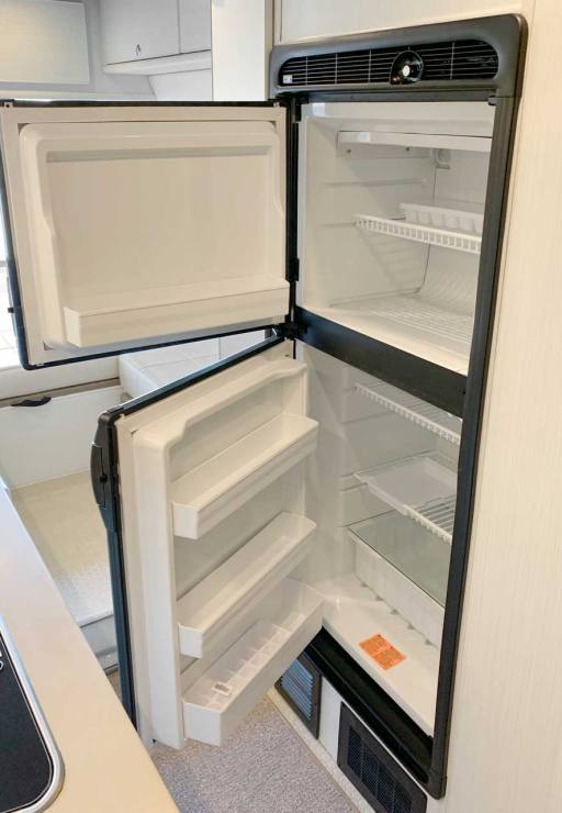 Upgraded Norcold 7CF refrigerator in the galley.