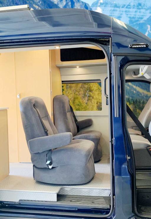 Upgraded van conversion upholstery and cabinet materials.