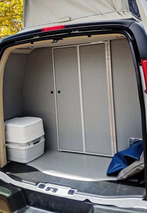 Plenty of storage space and room for a toilet in the rear.