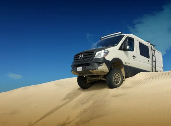Van in the desert - driving in the sand