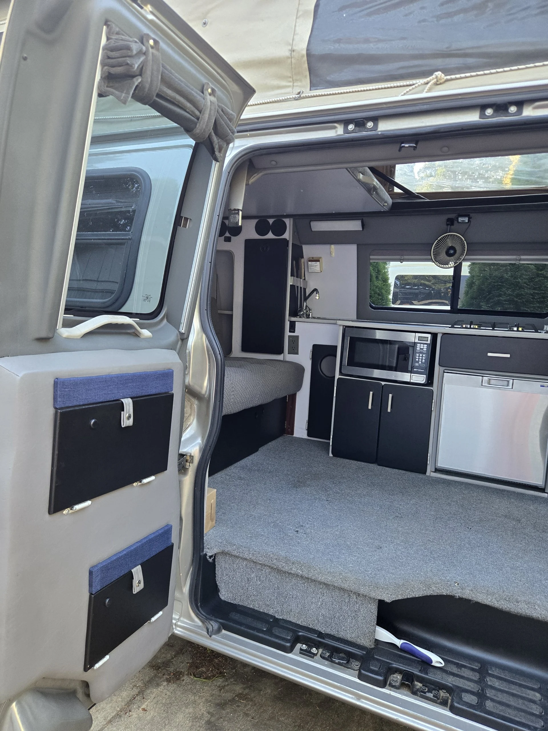 2001 Chevy Express 2500 EB50 Penthouse Top, rear doors open, interior and galley