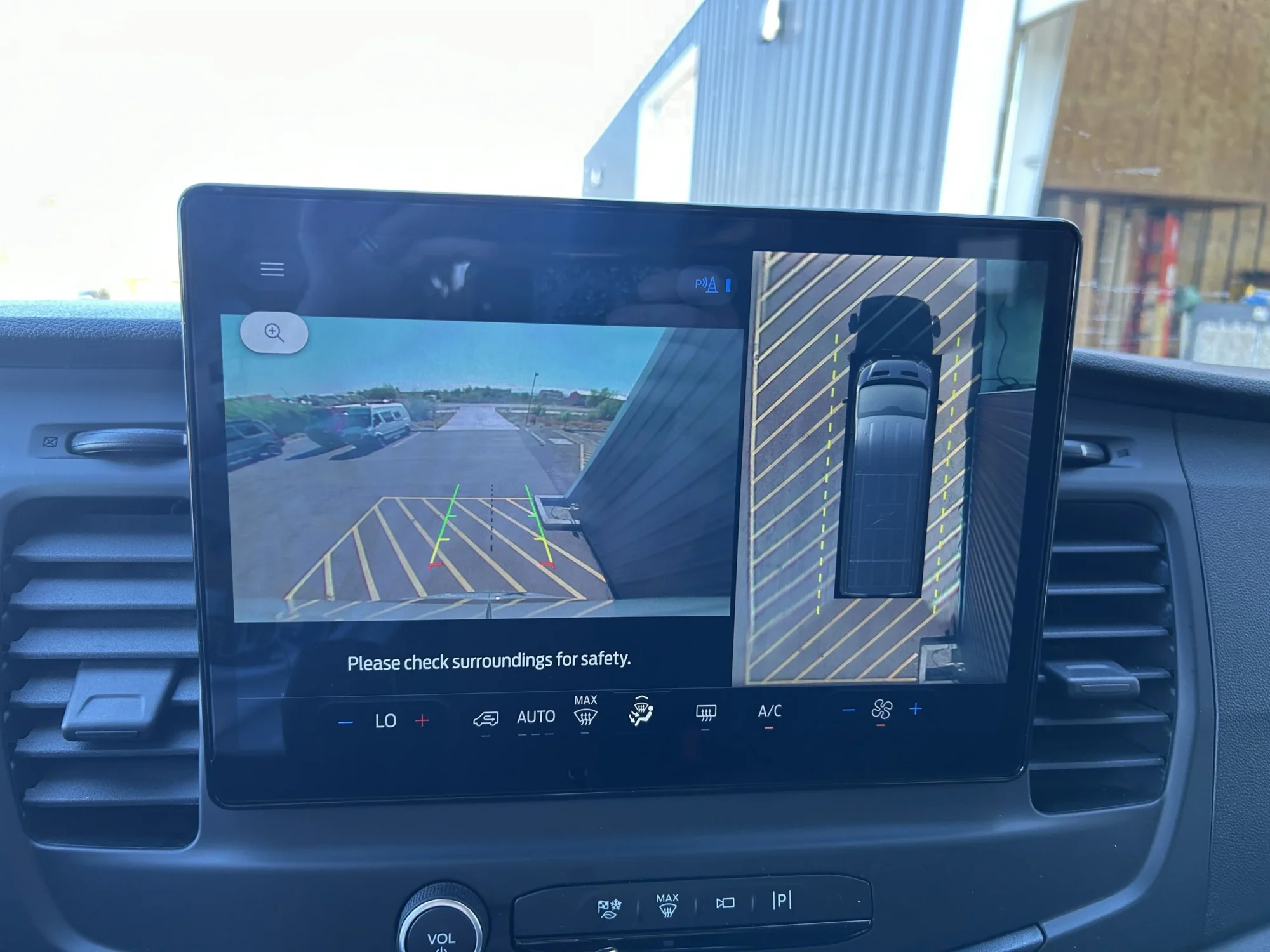 2024 Ford Transit 350 148 High Roof AWD, SYNC 4 center display showing 360-degree camera and rear view camera feed