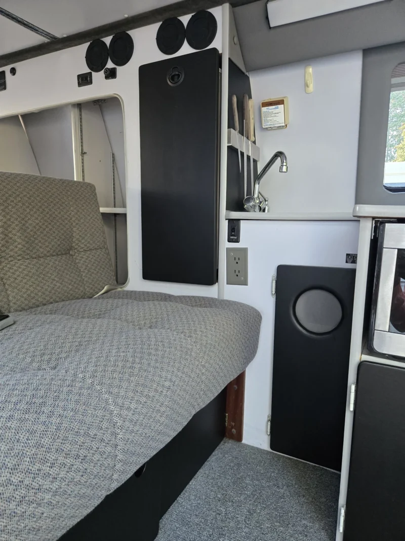 2001 Chevy Express 2500 EB50 Penthouse Top, rear sofa and sink area