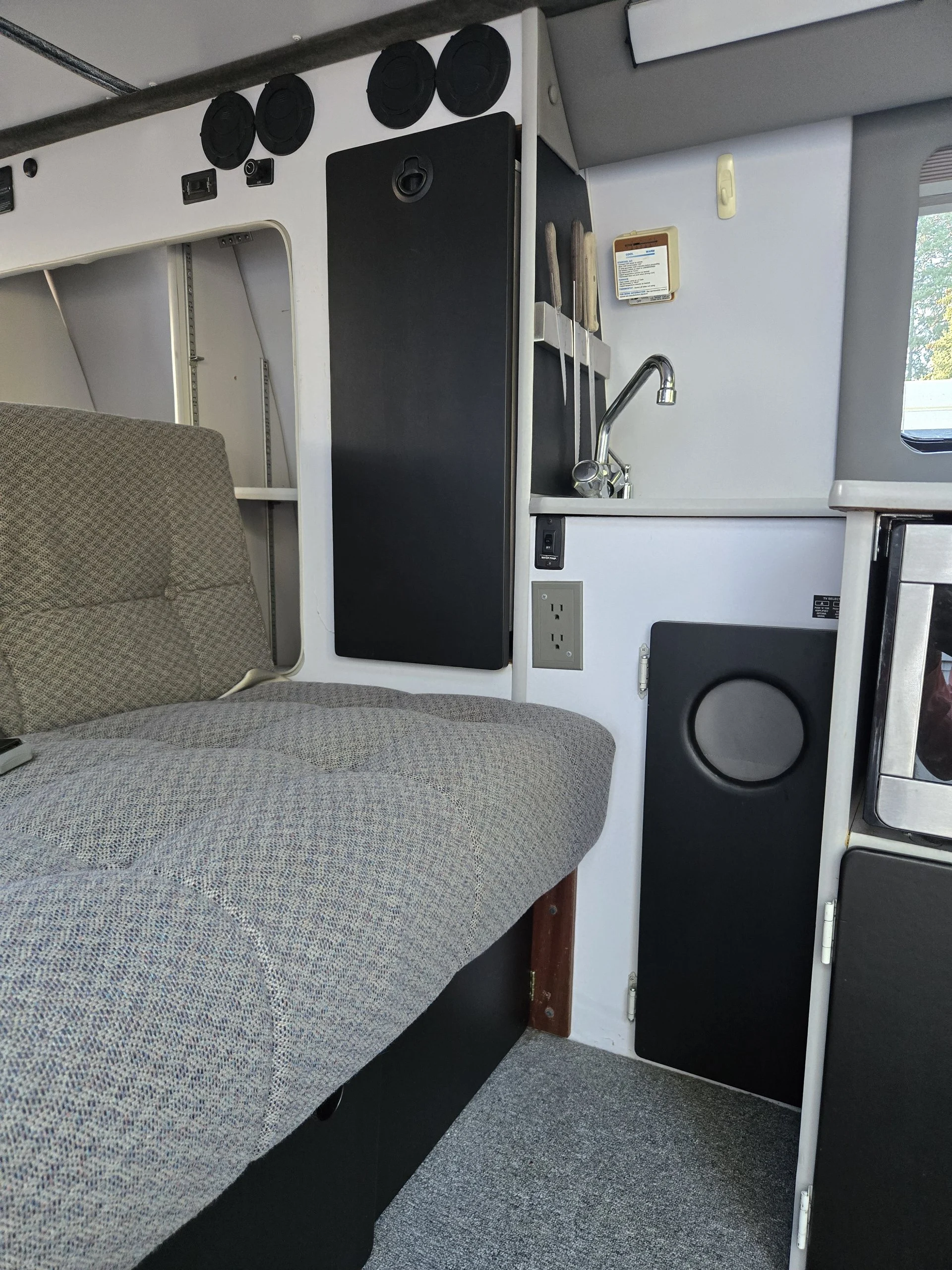 2001 Chevy Express 2500 EB50 Penthouse Top, rear sofa and sink area