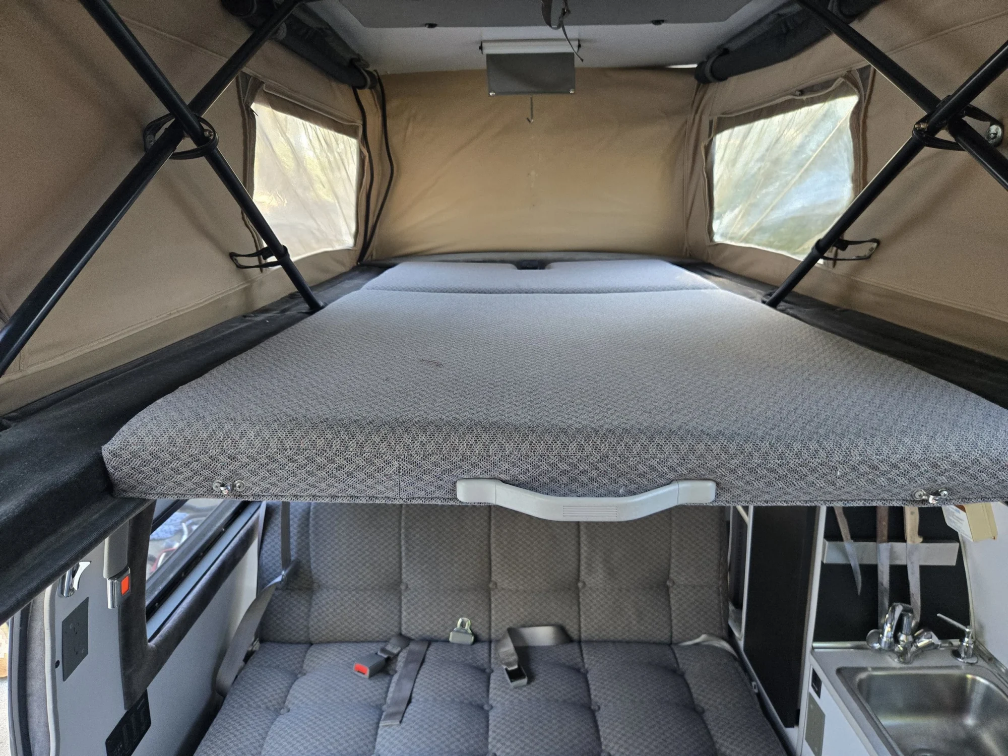 2001 Chevy Express 2500 EB50 Penthouse Top, Penthouse top bed above the sofa