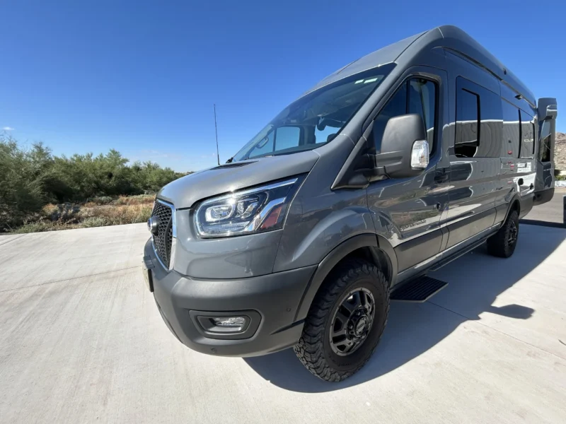 2024 Ford Transit 350 148 High Roof AWD, front driver-side three-quarter exterior hero view with doors closed