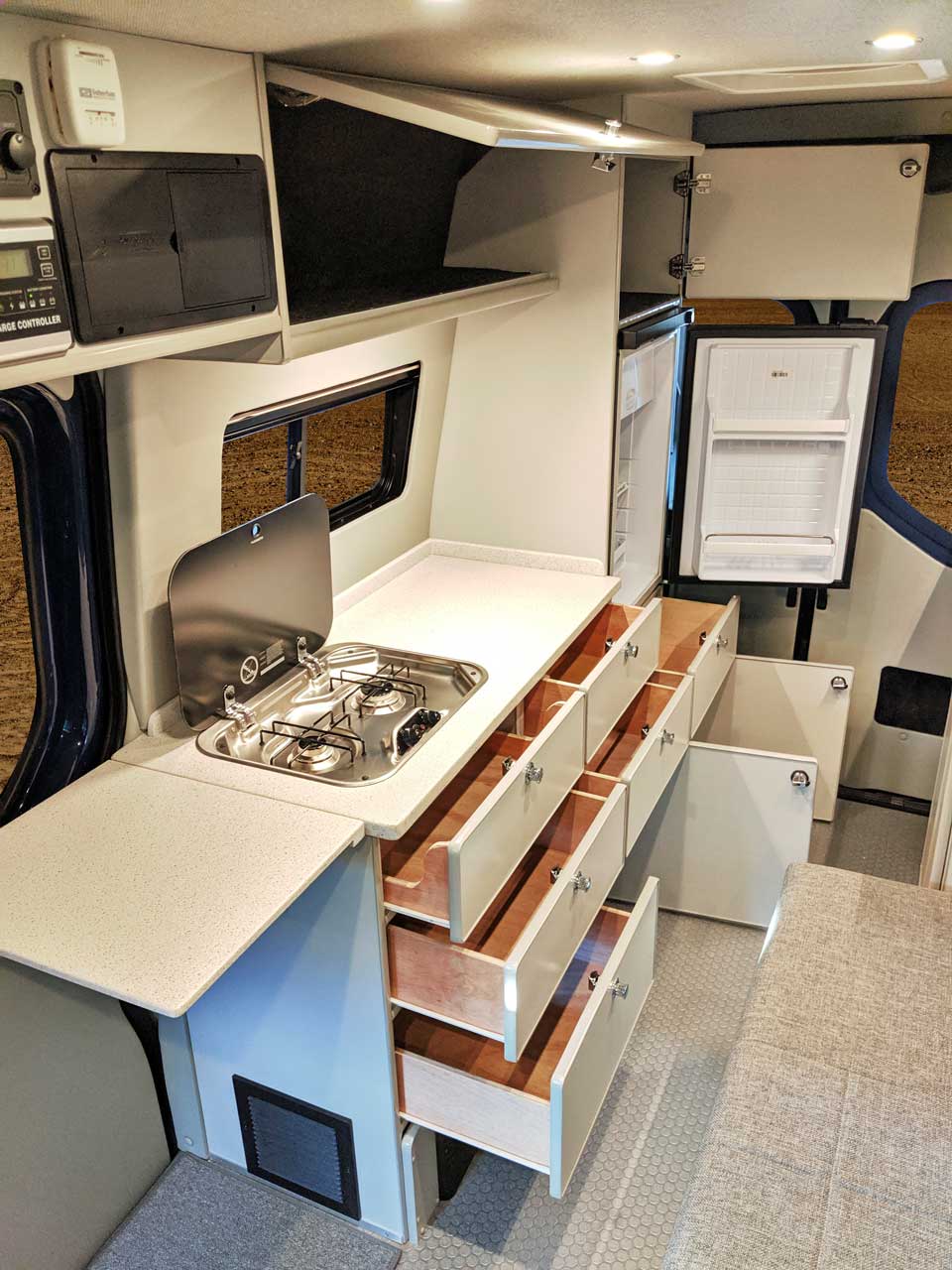 Galley features a propane cooktop and plenty of storage.