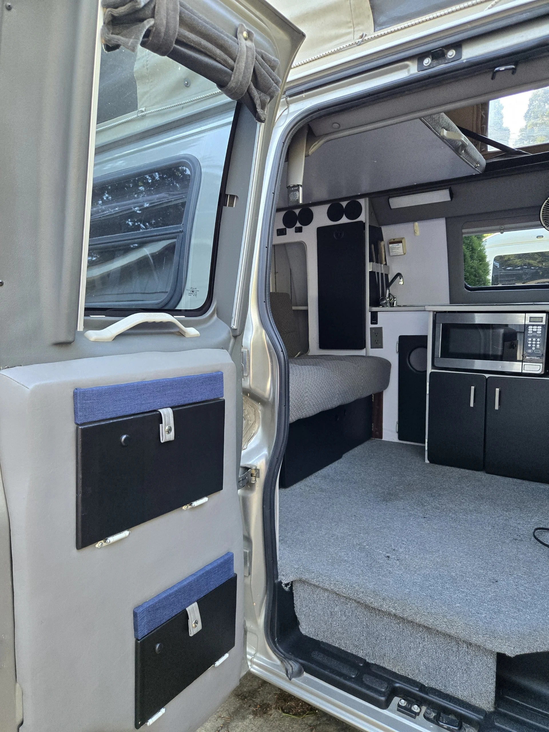 2001 Chevy Express 2500 EB50 Penthouse Top, rear doors open, interior