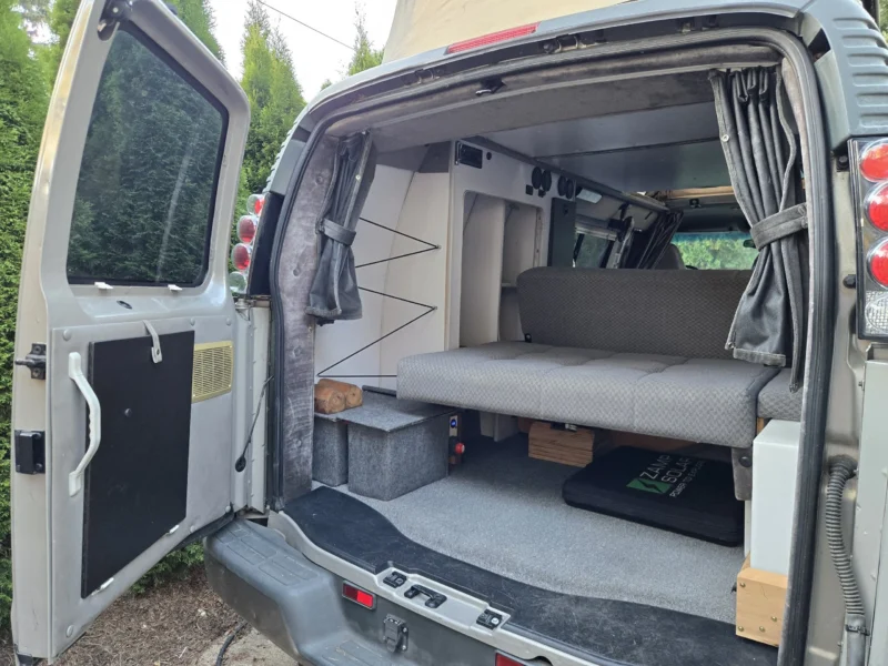 2001 Chevy Express 2500 EB50 Penthouse Top, rear doors open, rear sofa
