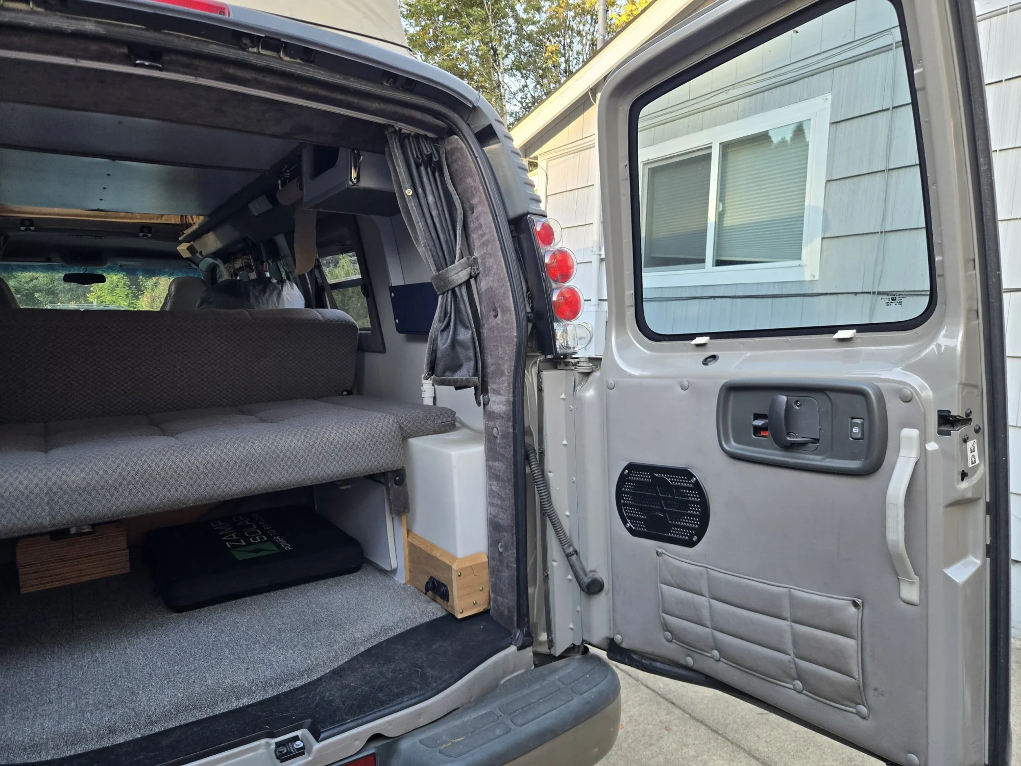 2001 Chevy Express 2500 EB50 Penthouse Top, rear doors open, rear sofa