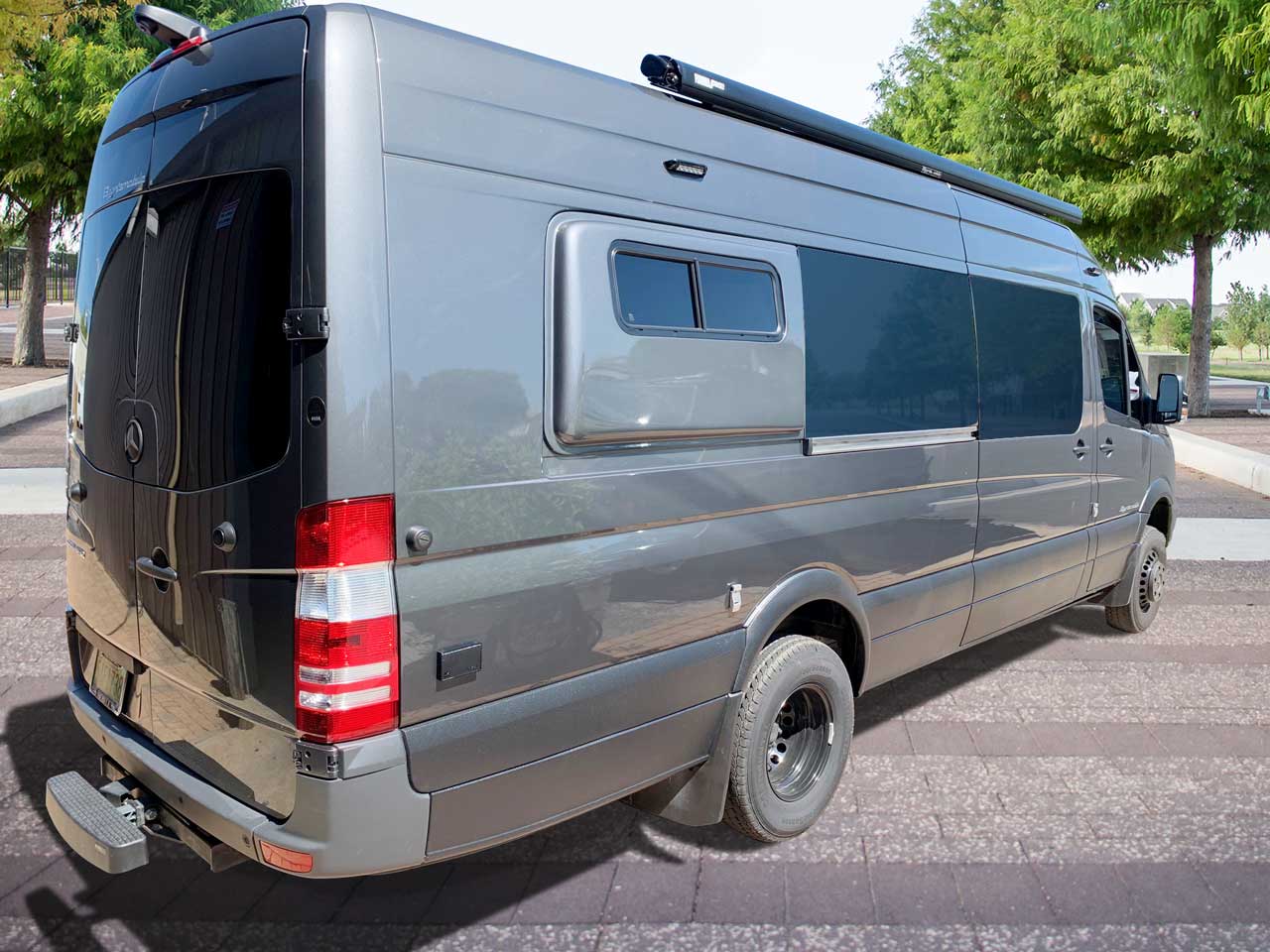 Van conversion with fiberglass flares.