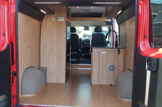 Plenty of storage space in the back of camper van conversion.