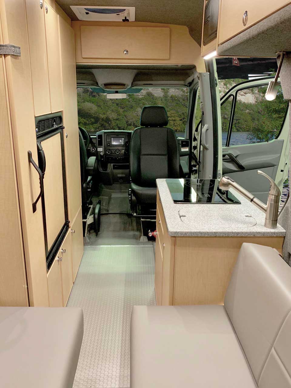 Dining and sleeping areas in the rear of the van.