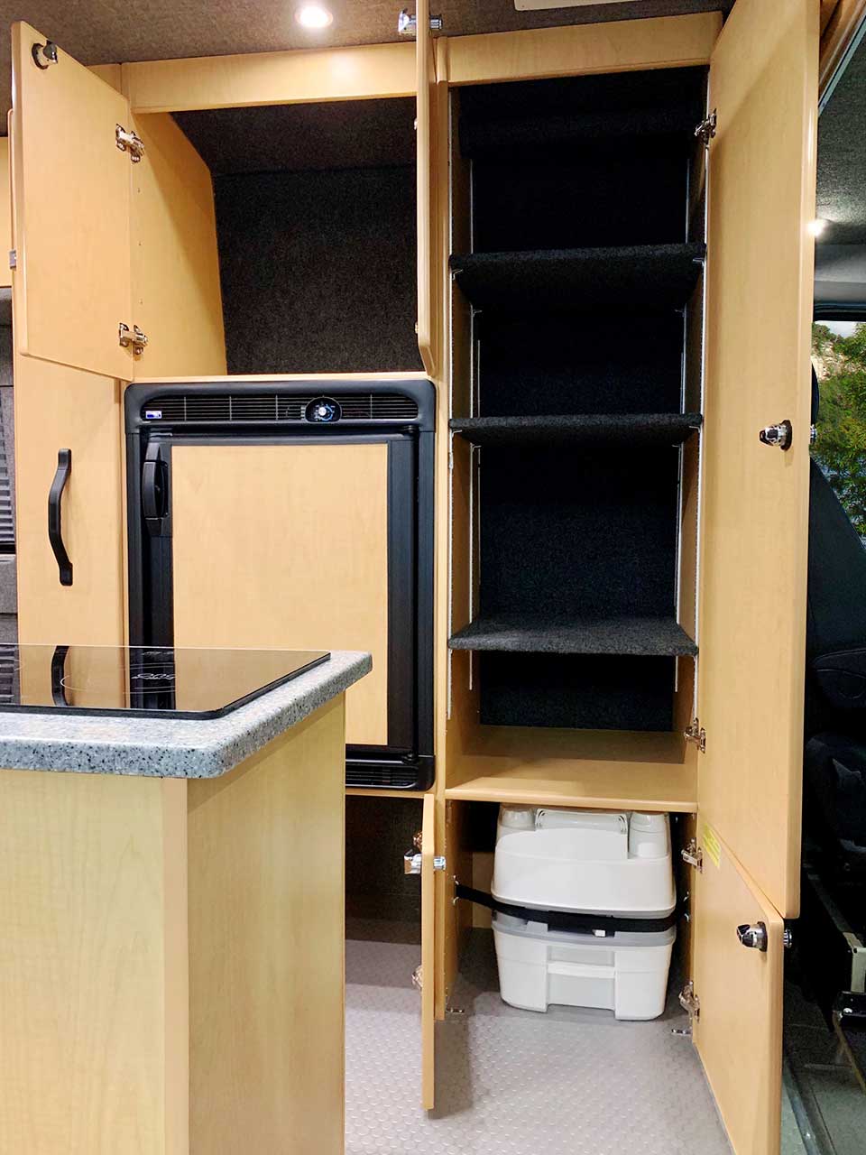 Plenty of storage upfront with tall cabinets.
