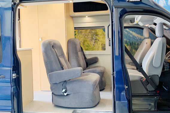 Upgraded van conversion upholstery and cabinet materials.