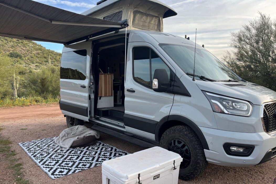 AWD Ford Transit Mid-Roof conversion and pop top down by Sportsmobile