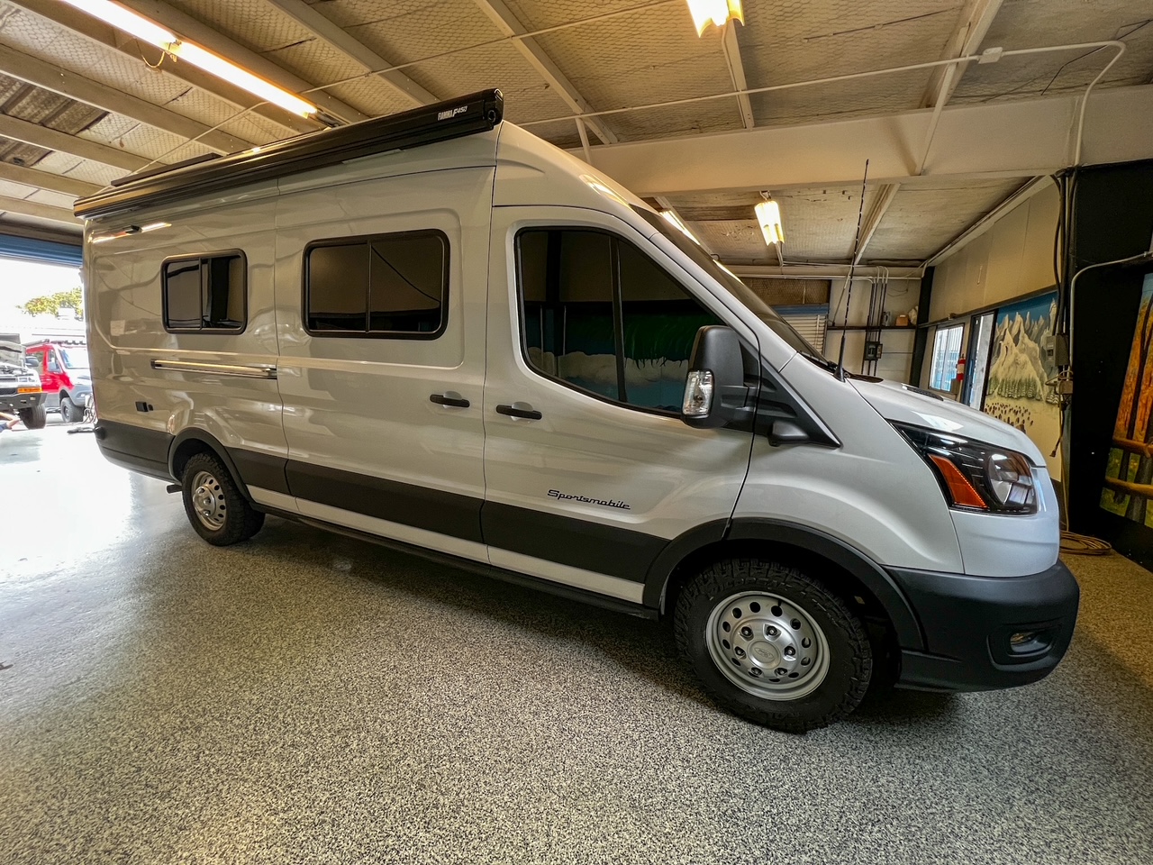 Ford Transit 148 high-roof rear dinette camper van