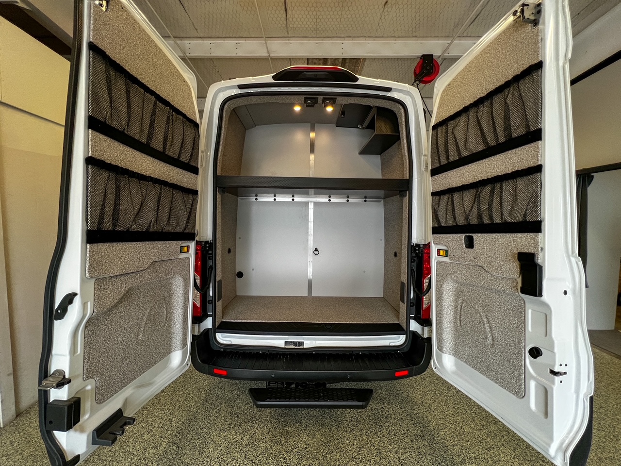 Ford Transit 148 high-roof rear dinette camper van