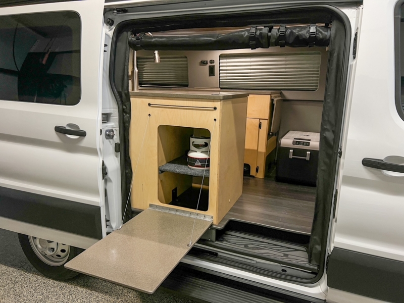 Ford Transit 130 low-roof penthouse camper van