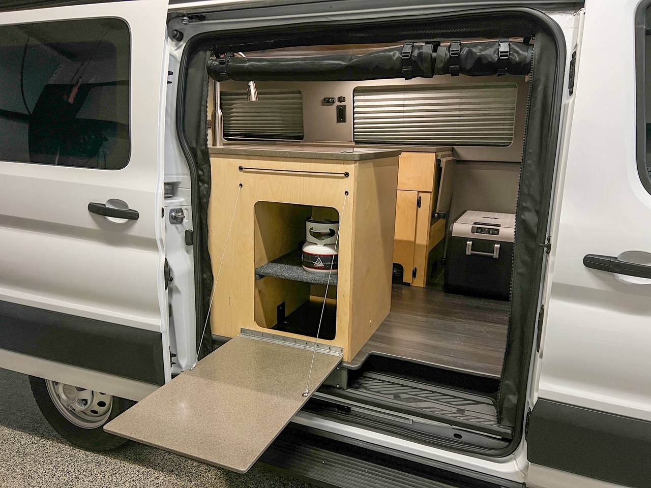 Ford Transit 130 low-roof penthouse camper van