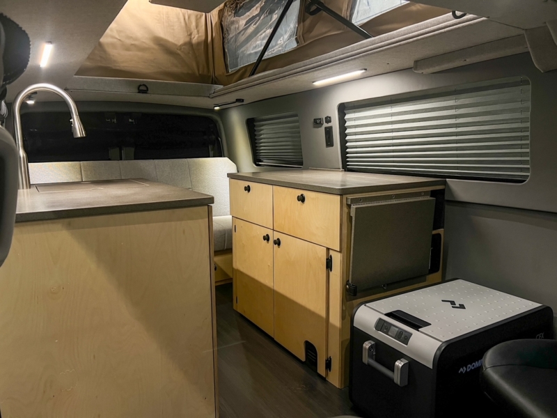 Ford Transit 130 low-roof penthouse camper van