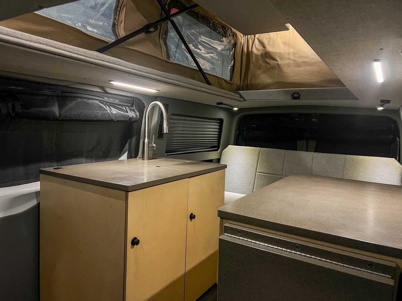 Ford Transit 130 low-roof penthouse camper van